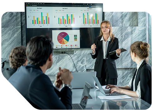 Person giving a presentation with charts to three colleagues